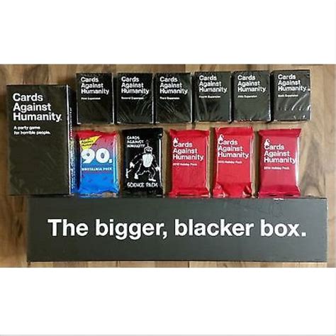 cards against humanity big metal box|Cards Against Humanity complete set.